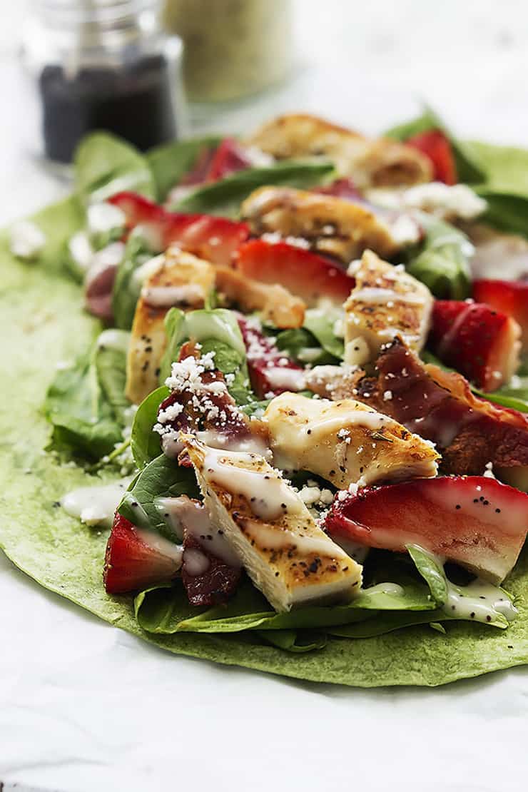 Chicken wrap with strawberries and bacon and spinach